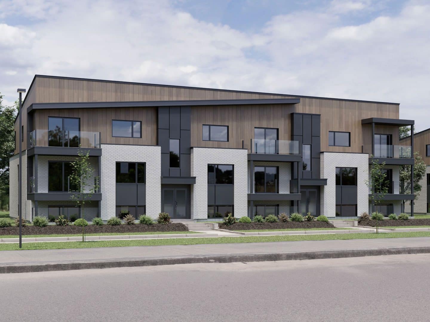 Modèle de multilogement nommé Vinkel-9, des logements qui ont un style contemporain. Vue de l'extérieur.